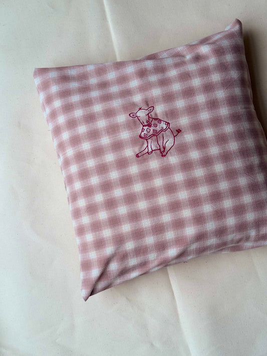 Pude med broderet motiv