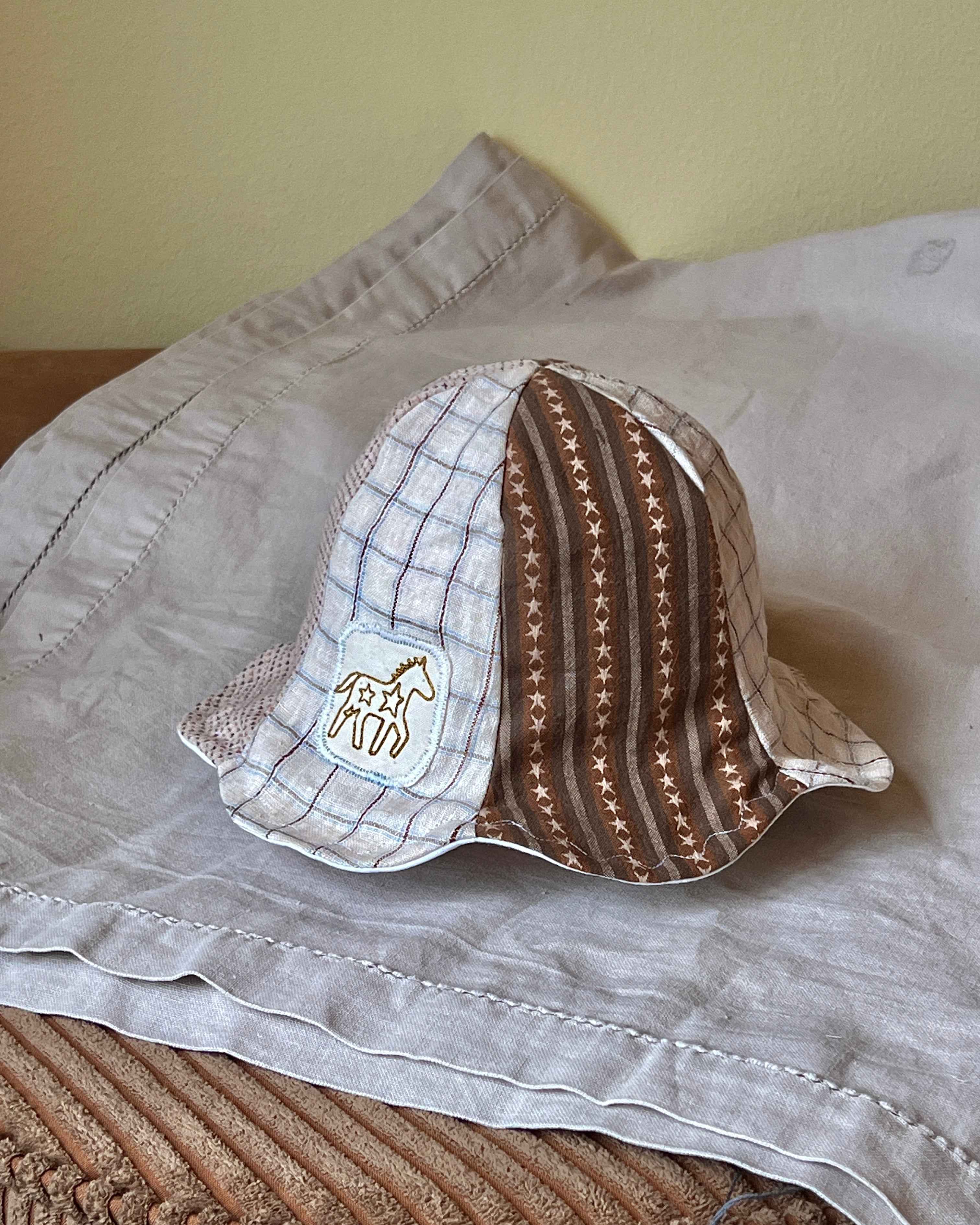 SMØRBLOMST sommerhat