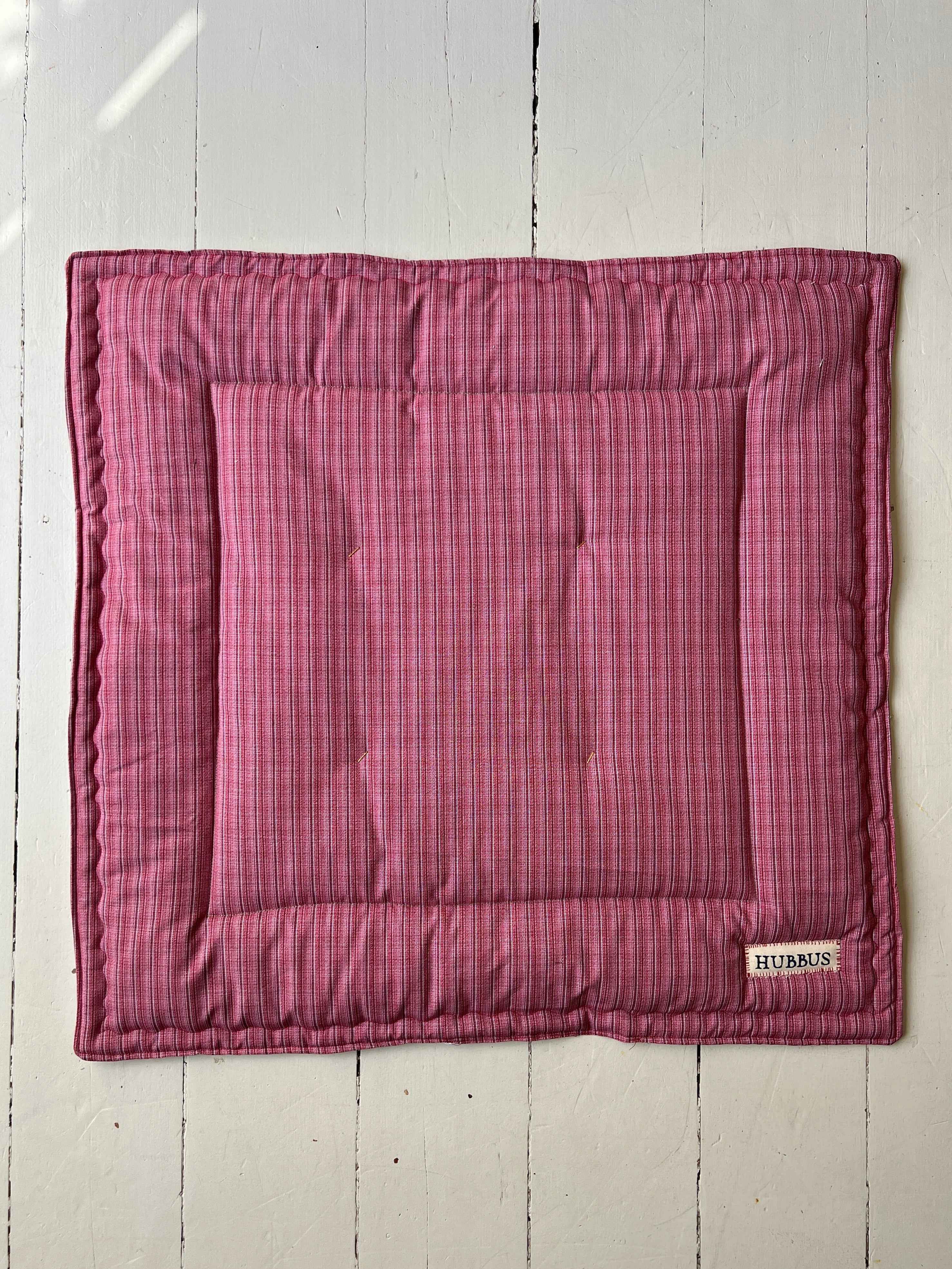 Hand-quilted baby mat
