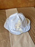 SMØRBLOMST sommerhat
