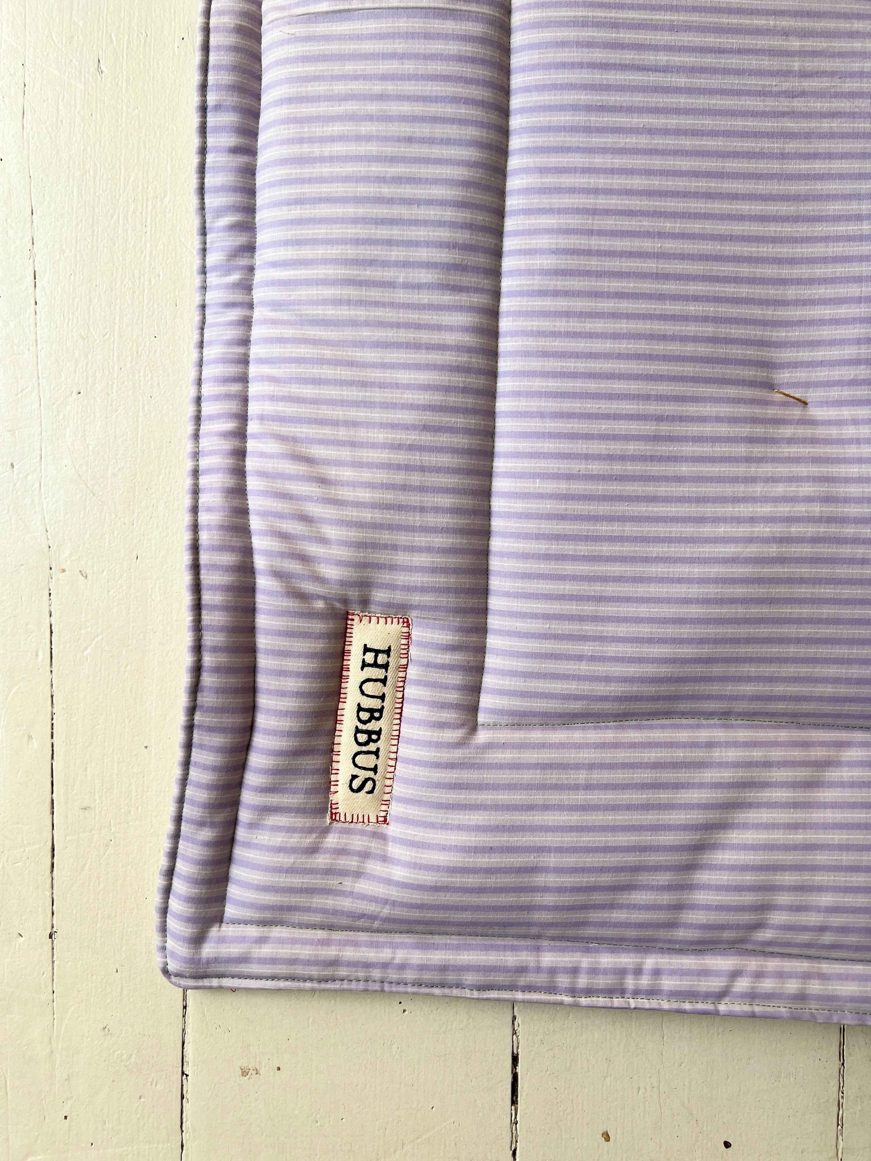 Hand-quilted baby mat