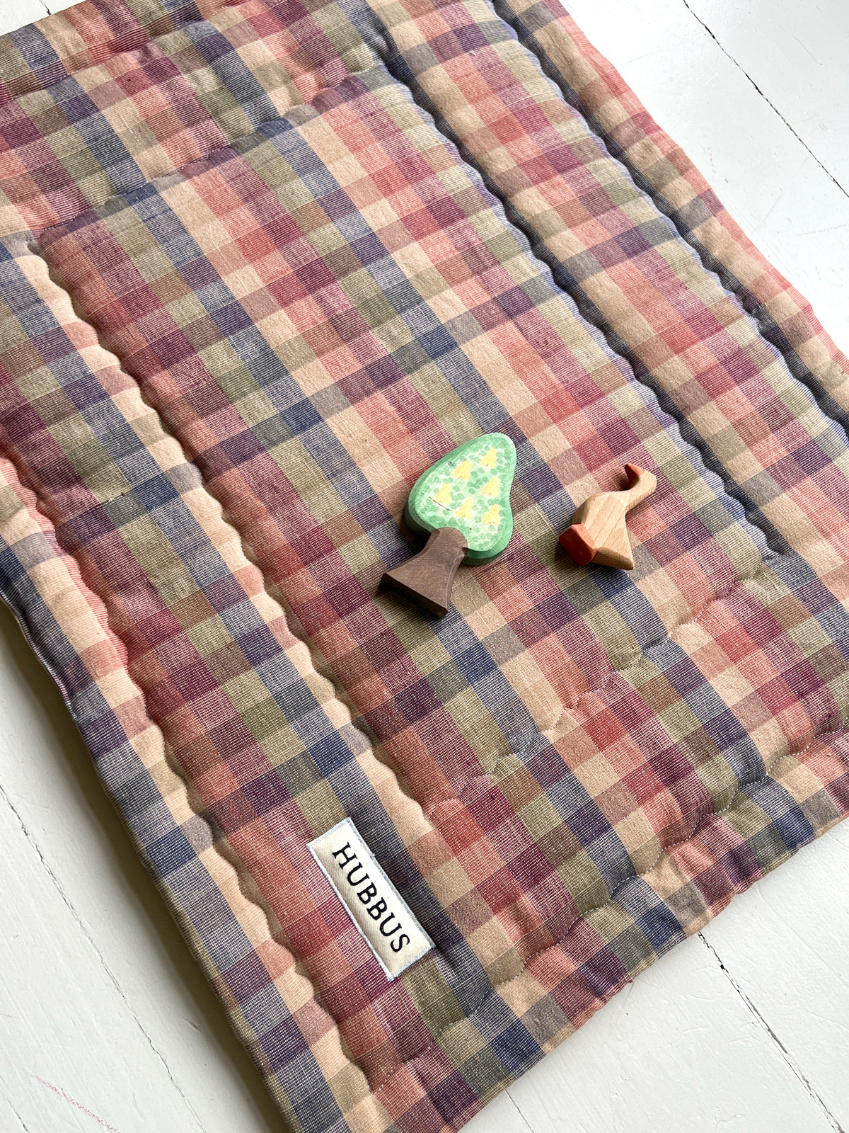 Quilted baby playmat