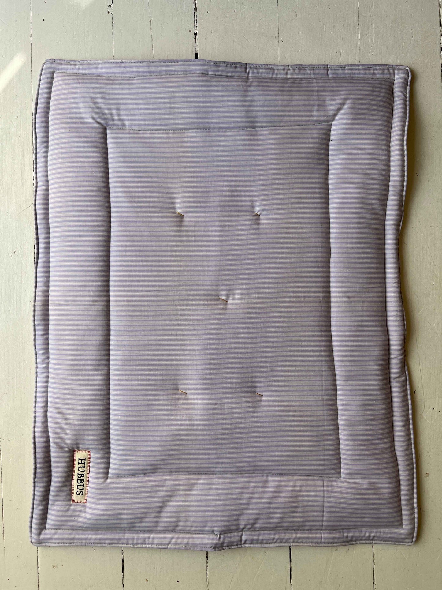 Hand-quilted baby mat