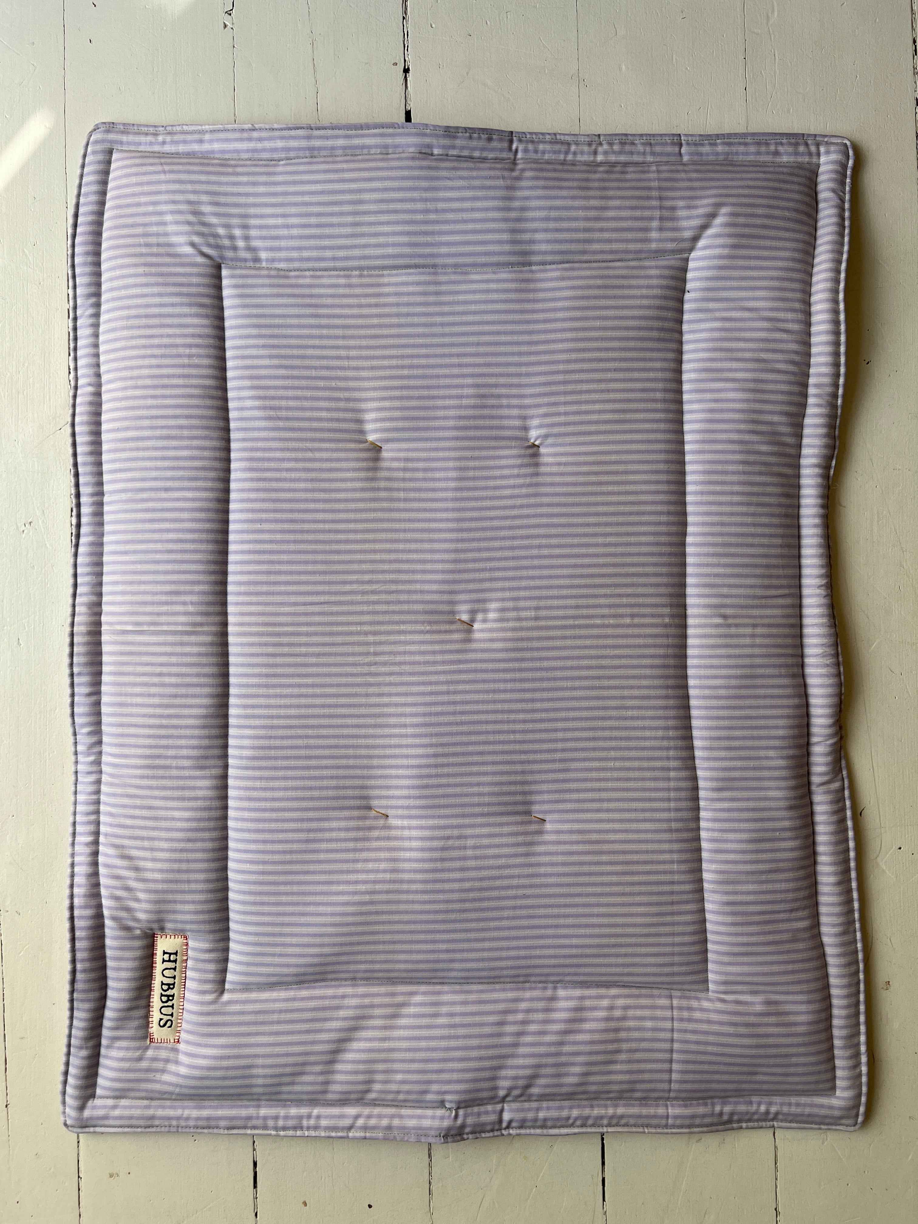 Hand-quilted baby mat