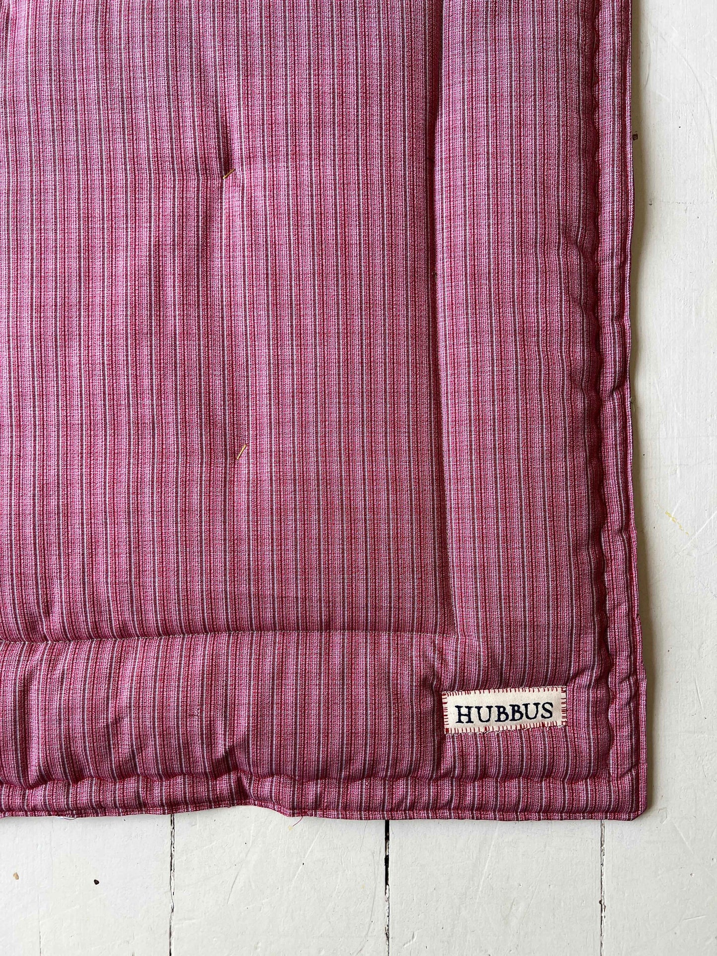 Hand-quilted baby mat