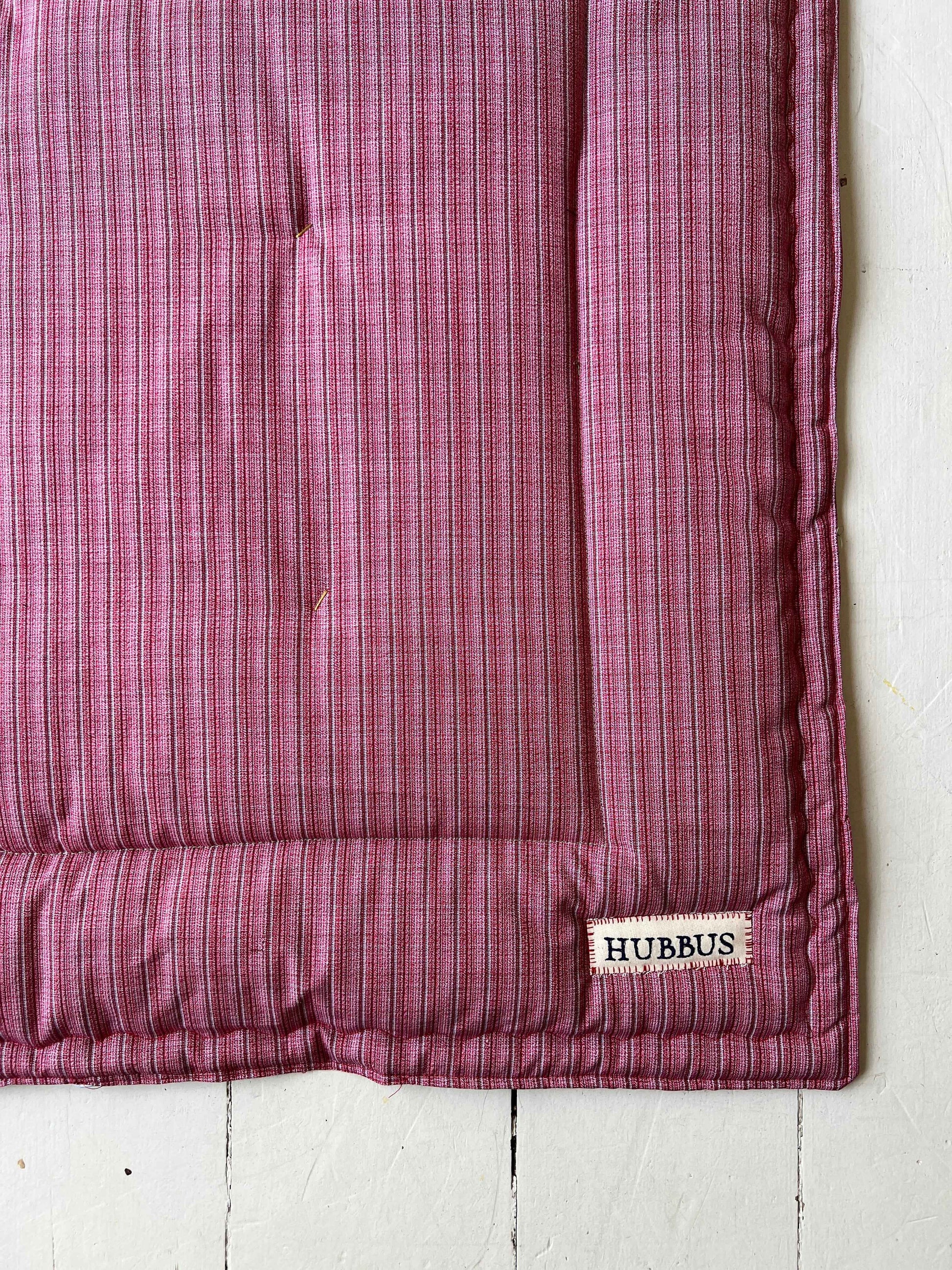 Hand-quilted baby mat