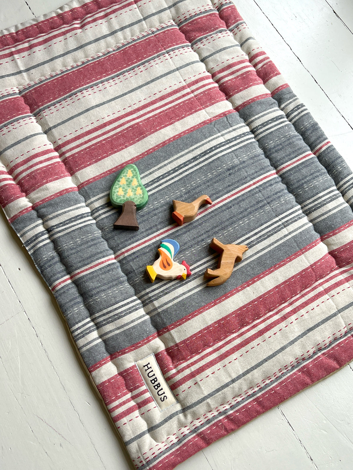 Quilted baby playmat